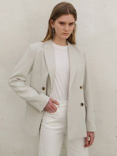 Editor's NotesThe semi-overfit blazer, made of lightweight and less wrinkled material, features a classic collar design, double-button closure, shoulder pads, and sleeve button decorations. In addition, it has improved completeness by adding cow horn buttons with the Neueyet logo on them, sides pockets, and inside pockets, a highly utilized item as a classic design that is good for spring and in the spring and fall. - Lightweight and less wrinkled material- Classic collar - Double-butt Button Decorations, Cow Horns, Collar Designs, Spring And Fall, Shoulder Pads, Horn, Classic Design, Cow, Blazer