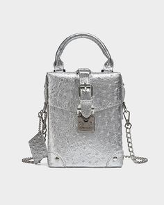 Make a bold statement with the Silver Ostrich Mini Tote Bag, a glamorous and eye-catching accessory that's perfect for adding a touch of luxury to any outfit. This stylish mini purse features a shimmering silver metallic finish and a unique boxy shape, making it a standout piece. The textured faux leather and silver-toned hardware create a cohesive and sophisticated look, while the detachable chain strap offers versatility. Rolling Duffle Bag, Nylon Travel Bag, Suitcase Set, Bag Suitcase, Duffle Bag Travel, Mini Tote Bag, Clutch Pouch, Functional Accessories, Mini Purse