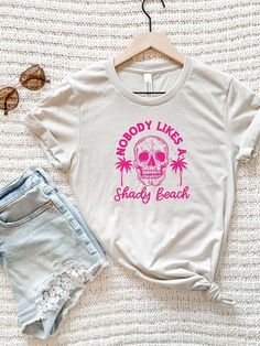 No One Likes A Shady Beach Graphic Tee100% combed and ring spun cotton Unisex sizing Pants Gift, Jumpsuit Skirt, Jewelry Candles, Graphic Tops, Chic Boutique, Tee Shop, Two Pieces, Clothes For Sale, Graphic Tee