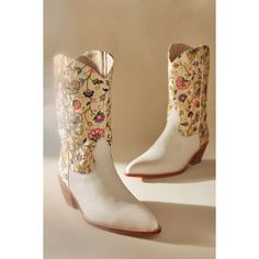 Vibrant Floral Embroidery Flourishes On These Western-Style Boots, Beautifully Constructed In A Lasting Leather For A Bohemian Statement That Is Soon-To-Be An Heirloom Staple. Zip Closure Leather, Silk Upper Leather Insole And Sole Hand Crafted Imported Dimensions 2" Heel Brand New With/ Without Tag Or Box May Have Been Tried In Store But In New / Good Condition Outsole Marked To Prevent Retail Returns Spring Embroidered White Boots, Spring White Embroidered Boots, Embroidered Closed Toe Summer Boots, White Embroidered Pointed Toe Boots, White Floral Print Round Toe Boots, Bohemian White Boots For Fall, Traditional Snip Toe Boots For Spring, White Embroidered Snip Toe Boots, Traditional Embroidered Boots For Spring