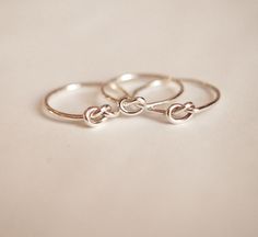 Set of 3 solid sterling silver knot rings perfect for gifting.  Each ring will come in its own gauze gift pouch with a friendship card.  These rings are hand tied from solid sterling silver wire 1mm thick - 18g. Handcrafted in my tiny retail jewellers studio located in historic Fort Langley BC. Canada.  I custom make each piece using ethically sourced materials. Friendship Rings For 3 Bff, Platonic Marriage, Fort Langley, Knot Rings, Pinecone Necklace, Langley Bc, Friend Rings, Rings Sterling Silver, Friendship Rings