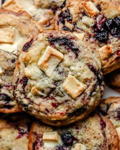 blueberry cheesecake muffins piled on top of each other