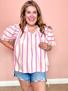 Get ready for some fun in the sun with our Papaya Punch Top! Featuring a playful stripe pattern and a flattering v neck, this short sleeve top is perfect for any summertime adventure. Stay stylish and comfortable all day long with this must-have addition to your wardrobe. Details: 100% Cotton Runs: OversizedKrista is wearing a Small Summer Striped Short Sleeve Tops, Striped Short Sleeve Summer Top, Striped V-neck Summer Tops, Summer Vacation Tops With Striped Collar, Beach Tops With Striped Collar And Short Sleeves, Pink Short Sleeve Top With Striped Collar, V-neck Short Sleeve Top For Summer Day Out, Playful Striped Tops For Beach, Playful Striped Tops For The Beach