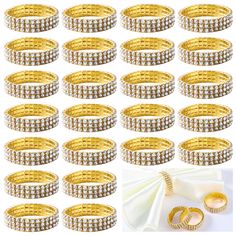 many different types of rings and bracelets with diamonds on the sides, all in gold