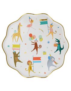 a white plate topped with animals and balloons