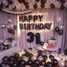 a birthday party with balloons and streamers