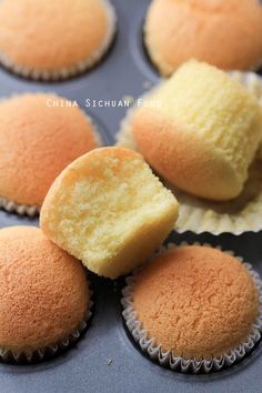 several cupcakes are sitting on top of each other in muffin tins