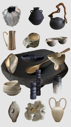 an assortment of vases, bowls and spoons are arranged on a black tray