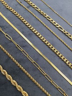 "18K Gold Filled Chain Necklace,Curb,Figaro, Vine ,Rope Chain,Christmas Gift,Paperclip Chain,Snake Chain,Mother's Day Gift, Gift For Her -THIS Chain -Not Tarnish -not tarnish -hipoalergenic -Rust or turn your skin green -Safe to wear in water -this chain &is more durable than other materials commonly used such as silver and gold -HIPOALERGENIC ∙ Available Length: 16\" - 18\" - 20\" - 22\" - 24\" - 28\"   Gift ∙ Package  ∙ We can include your personalised notes in both regular and gift-wrapped packaging. The cost of the gift wrap is £2 - Delivery Time ∙ Delivery times are shown in the listing but may vary during peak seasons. Please check our homepage or individual listings for the most up-to-date times. - Visit our homepage for more products. etsy.com/uk/shop/CosmosJewelrygifts Make yourse Snake Chain Link Necklace With Box Chain For Gift, 14k Gold Rope Chain Jewelry As Gift, Gold Snake Shape Chain Necklace Gift, Gold Plated Rope Chain Necklace As Gift, Snake Shape Gold Chain Necklace Gift, 14k Gold Rope Chain Jewelry For Gift, Gold-tone Metal Snake Chain Necklace, Gift Package, Rope Chain