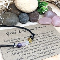 "(Gift wrap available at check out) If you need more than 1 gift wrap, please buy them separetly in my shop. You'll find the option under the section \"Gift Wrap\")  Add Grief Affirmation Cards  This grief and loss crystal bracelet is made up of Smoky Quartz, Citrine, Clear Quartz, Rose Quartz and Amethyst. All my crystals are natural in order to preserve all their qualities. These crystals have been chosen and put together based on their qualities to help and support for any kind of loss. About Crystals Healing, Bracelet Crystal, String Bag, Affirmation Cards, Healing Bracelets, Quartz Rose, Sympathy Gifts, Bracelet Handmade, Crystal Bracelet