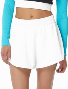 Designed to take you to the beach and beyond, meet the Beach House Sport Dynamic Swim Skort. A ribbed waistband adds a textured touch to simple solids. Beach House is designed with high-end fabrics that bend with you for extra comfort, easy fit and shape retention. | Women's Beach House Sport Dynamic Swim Skort, White, 14 Vacation Bottoms With Contoured Waistband In Solid Color, Vacation Bottoms With Contoured Waistband, Solid Bottoms With Contoured Waistband For Vacation, Summer Solid Color Activewear With Elastic Waistband, Summer White Bottoms With Contoured Waistband, White Bottoms With Contoured Waistband For Summer, Solid Bottoms With Elastic Waistband For Poolside, Relaxed Fit Solid Swimwear With Elastic Waistband, Sporty Bottoms For Beach Season