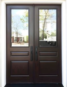 two double doors with glass on each side