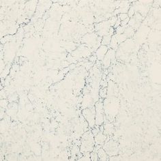 a white marble textured surface with blue streaks