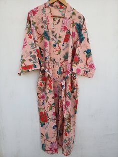 This Robe we makes from 100% Cotton printed fabric. The fabric print is Anokhi Floral which is very popular in all over the world . We use pure cotton cambric fabric . This is free One size robe . There is both side pocket in robe. Length = 120 cms. ( 48 inches) Pink Summer Robe For Bedtime, Summer Pink Robe For Bedtime, Pink Summer Robe For Sleepover, Printed Summer Robe For Home, Printed Summer Home Robe, Summer Printed Robe For Home, Summer Printed Home Robe, Pink Floral Print Robe For Home, Pink Floral Print Home Robe