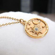 Elevate Your Style With This Stunning Celestial Necklace ! Featuring An Intricately Detailed Sun And Moon Medallion, This 18k Gold Plated Stainless Steel Pendant Is Both Minimalistic And Eye-Catching. Perfect For Layering Or Wearing Solo, This Piece Will Quickly Become Your Everyday Favorite. With A Delicate Chain And A Touch Of Sparkle, It's A Timeless Design For Any Occasion! Features: 18k Gold Plated For Lasting Shine Durable Stainless Steel Intricate Sun & Moon Medallion Design Minimalist, Y Sun Moon Necklace, Celestial Pendant, Gold Medallion Necklace, Sun And Moon Necklace, Astrology Jewelry, Celestial Necklace, Boho Chic Jewelry, Gold Statement Necklace, Dainty Gold Necklace