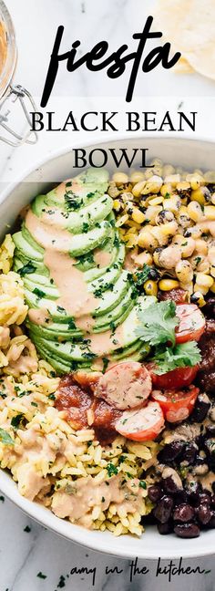 a white bowl filled with black bean and corn salad