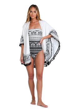 This black and white monochromatic print features an allover tropical motif perfect for any vacation destination. Tassel trim gives this cover-up a playful style that is at once carefree and put together. The square, belted front is offset by loose-fitting butterfly sleeves for a decidedly feminine silhouette. [split] Details Kimono cover-up Square, belted front Breezy butterfly sleeves Black/Ivory rope and black tassel trim Fabric 100% Polyester White Tropical Cover-up For Resort Season, White Beachwear Cover-up For Vacation, White Printed Cover-up For Pool, White Tropical Style Cover-up For Resort Season, White Printed Summer Cover-up, White Tropical Swimwear For Resort Season, White Beachwear Cover-up For Resort Season, White Printed Swimwear For Resort Season, White Beachy Swimwear For Resort Season