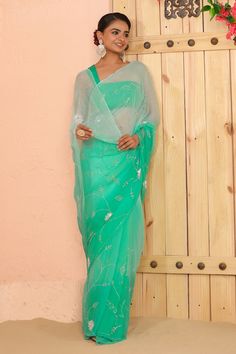 Turquoise blue two tone saree with floral vine embroidery using sequins, aari, tube light work. Comes along with unstitched blouse piece. - Aza Fashions Bollywood Style Pre-draped Saree With Sheer Dupatta For Summer, Summer Designer Saree With Mirror Work, Designer Mirror Work Saree For Summer, Summer Designer Pre-draped Saree With Zari Work, Summer Designer Wear Pre-draped Saree With Zari Work, Summer Pre-draped Saree With Zari Work For Reception, Summer Wedding Pre-draped Saree With Zari Work, Designer Georgette Saree For Summer, Designer Summer Georgette Saree