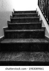 black and white photograph of stairs leading up