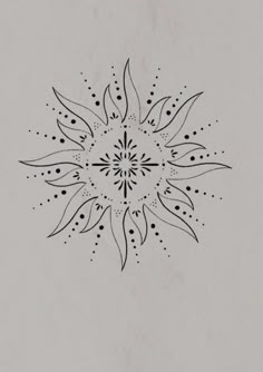 a black and white drawing of a flower with dots in the center on a gray background