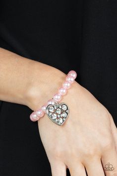 Cutely Crushing Pink Pearl - Heart Charm - Stretchy Bracelet - Paparazzi Accessories - A dramatically oversized white rhinestone encrusted silver heart charm dangles from a stretchy strand of bubbly pink pearls, creating a dazzle around your wrist. Paparazzi Jewelry Images, Pink Pearl Bracelet, Pink Pearls, Rose Gold Beads, Pearl Heart, Jewelry Images, Paparazzi Accessories, Rhinestone Heart, Stretchy Bracelets