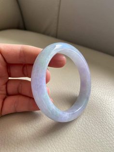 "🌈 Jade Bangle 56.8mm (2.24\"), Round Shape, Light Lavender 🌷 Untreated Natural Jadeite/ Grade A Jade 🌷 Certification : Yes 🌷 Jade from Myanmar/ Burma 🌷 Shape : Round 🌷 Inner diameter : 56.8mm / 2.24\" 🌷 Color : Light Lavender 🌷 Free standard shipping from Hong Kong with tracking included 🌷 Take approximately 7-21 days to arrive worldwide ❤️ In Chinese Culture: Young people wear jade pendant will have a prosperous life, attracts good luck and friendship Old people wear jade pendant will Jade Accessories, Jade Charm, Chinese Jade, Lavender Green, Light Lavender, Jade Bangle, Gemstones Jewelry, Jade Bracelet, Jade Jewelry