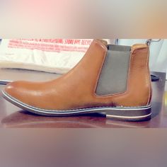 A Classic Leather Boot Brings Polished Style And Essential Comfort To Your Wardrobe. Casual Brown Chelsea Boots With Leather Sole, Casual Brown Chelsea Boots With Plain Toe, Masculine Brown Chelsea Boots With Round Toe, Polished Style, Leather Boot, Mens Shoes Boots, Men's Boots, Classic Leather, Black Tan