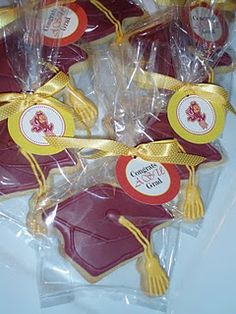 graduation cookies are wrapped in cellophane to look like they have tassels on them