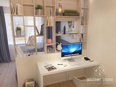 a white desk with a computer on top of it