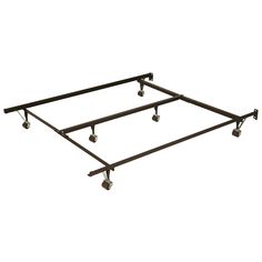 a metal bed frame with four casteors and wheels on the bottom half of it