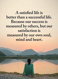 a person sitting in front of a body of water with a quote on it that says, a satisfied life is better than a successful life because our success is measured by others