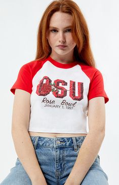 PacSun exclusive! Cheer on your team in style with the Rose Bowl OSU Rally Ringer T-Shirt from the Champion x Rose Bowl collection. Featuring short contrast raglan sleeves, an OSU Rose Bowl 1997 graphic, a crew neckline, and a cropped fit, this tee brings a sporty, vintage flair to your game-day wardrobe.Short raglan sleevesCrew necklineRose Bowl graphicCropped fit84% recycled polyester, 16% spandexMachine washableModel is wearing a size mediumModel measurements: 5’8” height, 30.5” bust, 24.5” waist, 35.5” hipsLearn more about PacSun eco items Champion Womens x Rose Bowl OSU Rally Ringer T-Shirt - White/red size Small Collegiate Red Summer Tops, Red Varsity T-shirt For Sports Season, Red T-shirt For College Summer Events, Red T-shirt For College Summer, Red Summer T-shirt For College, Red Retro Top For Game Day, Retro Red Top For Game Day, Red Varsity T-shirt For Sports, Red Varsity Top With Graphic Print