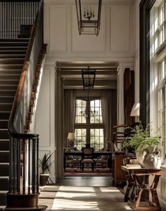 an elegant entry way leading to the second floor