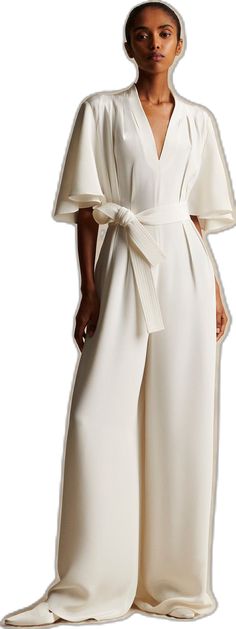 Elegant Fitted Jumpsuit For Wedding Guest, Elegant Jumpsuits And Rompers For Wedding Guest, Chic Silk Pantsuit For Party, Elegant Silk Fitted Jumpsuits And Rompers, Elegant Spring Wedding Guest Pantsuit, Elegant Spring Pantsuit For Wedding Guest, Elegant Silk Jumpsuits And Rompers For Party, Silk Pantsuit For Spring Evening, Elegant Silk Jumpsuit For Party