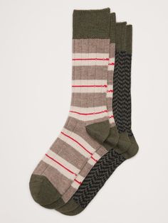 This sock is knitted from our best-selling blend of beautiful Merino wool and modal, which adds softness and a smooth finish.  Temperature Regulating Sustainability: Made with TENCEL™ modal, sourced from European beechwood trees, harvested from sustainably managed forests.  Set of 2 pairs.  Fits men's shoe sizes 8-12. Sock Packs, Wool Socks, Knit Stitch, Men Shoes Size, Waffle Knit, 2 Pack, Merino Wool, Olive Green, Banana Republic