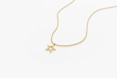 Gold KT: 14K Charm 10mm x 10mm The delicate gold chain holds a beautifully crafted star charm, symbolizing hope and good fortune. Measuring approximately 10 x 10 mm in size, this necklace is the perfect size for everyday wear. Whether you're looking for a special gift for a loved one or simply treating yourself to a beautiful piece of jewelry, this lucky star charm necklace is a timeless and meaningful choice. Star Necklace Gold Thick Chain, Delicate Star-shaped Yellow Gold Necklace, Dainty Yellow Gold Star Charm Necklace, Delicate Yellow Gold Star Necklace, Delicate Yellow Gold Charm Necklace With Star Charm, Delicate Yellow Gold Star Charm Necklace, Yellow Gold Charm Necklace With Star Of David Charm, Yellow Gold Everyday Charm Necklace With Star Charm, Elegant Star Charm Necklace, Tarnish Resistant