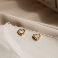 • Material: High Quality Solid 925 Sterling Silver• Finish: Sterling Silver ∙ 18K Gold• Featuring 7mm Heart Shaped Pearl Studs with High Quality Pave CZ Diamonds SKU: RR-ER161 Old Jewelry Box, Pearl Heart, Heart Stud Earrings, Heart Shaped Earrings, Tiny Diamond, Old Jewelry, Timeless Jewelry, Heart Studs, Cz Diamond