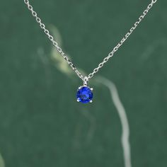 Sapphire Blue CZ Pendant Necklace  in Sterling Silver,  0.5 carat Sapphire Blue Zircon Necklace, Blue Necklace Dimensions : 40+5cm extension chain.  Stone size is available in  5mm (0.5ct) or 6.5mm (1ct）- for size comparison, please see the last picture.  Metal Stamp: 925 SRS ( SRS is our brand initials for Silver Rain Silver) Materials and Care: These are made of sterling silver and coated with precious metal Rhodium. They are hypoallergenic. They are tarnish resistant but please keep in a seal Blue Diamond Necklace With Prong Setting, Blue Sapphire Necklace With Prong Setting, Sapphire Birthstone Necklace In Lab-created Sapphire, Sapphire Birthstone Necklace With Lab-created Sapphire, Blue Diamond Cut Necklace In Sterling Silver, Lab-created Sapphire Birthstone Necklace, Blue Sapphire Birthstone Necklace For Anniversary, Minimalist Blue Jewelry With Prong Setting, Blue Pendant Birthstone Necklace For Anniversary