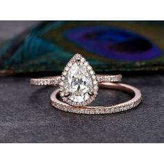 an engagement ring set with a pear shaped diamond