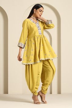 Yellow peplum kurta with aari thread embroidered motifs. Comes with dhoti pant. - Aza Fashions Festive Gota Work Sets With V-neck, V-neck Cutdana Sets For Navratri, Traditional V-neck Kurta With Pallu, V-neck Sets With Gota Work For Eid, Traditional V-neck Sharara For Diwali, Navratri V-neck Kurta With Pallu, Traditional V-neck Sets With Zari Work, Bollywood Anarkali Set With Tilla For Eid, Traditional V-neck Wear For Navratri