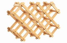 several wooden pegs are stacked on top of each other to form a wall decoration