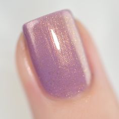 Lilac Bridges is just... wow! What we have here is an incredibly delicate lilac shade kissed with an assortment of gold shimmers for a heavenly finish. Look closely in the right lighting and you'll catch gorgeously subtle hues of red travelling up the curves of your nails. If you're into delicate shades, Lilac Bridges is an absolute must! The semi-translucent, jelly-leaning formula of our shimmer polishes allows for maximum balance, depth, and effect payoff. Great on their own or paired with you Shimmer Nail Polish, Lilac Nails, Nails Nailpolish, Nail Shimmer, Best Nail Art Designs, Nail Art Wedding, Nail Polish Sets