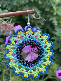 Beaded dangle earrings  Measurements do not include the earring wire hook:  5.4cm long 5.2cm wide Blue Beaded Dangle Flower Earrings, Blue Flower Earrings With Colorful Beads, Blue Flower Earrings With Colorful Beads As Gift, Gift Blue Flower Earrings With Colorful Beads, Crafting Beaded Drop Earrings For Pierced Ears, Blue Round Beaded Earrings With Ear Wire, Earring Wire, Le Crochet, Handmade Charms