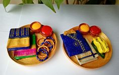 two wooden plates with different items on them