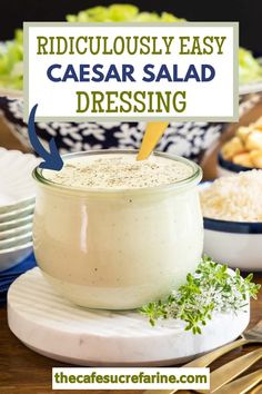 a close up of a salad dressing in a jar