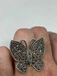 Vintage ring surrounded by Swiss cut fine Marcasite Sterling silver Size 6 can be sized by my jeweler. His service charge is $10-$20 All rings are shipped in a nice gift box. Check out our over a THOUSAND great reviews Engraving is $4 per letter and is not always perfect depending on the piece. It can take a few days if the jeweler is busy. This is payable to Paypal Judithsltd@gmail.com Silver Butterfly Ring For Formal Occasion, Silver Butterfly Jewelry For Collectors, Antique Silver Butterfly Jewelry, Big Statement Rings, Gothic Ring, Mermaid Ring, Marcasite Ring, Sterling Silver Marcasite, Gothic Rings