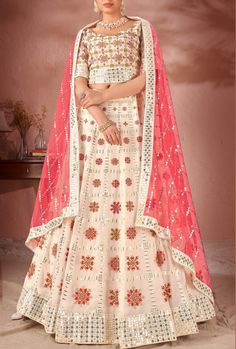 This exquisite Multicolour Lehenga Choli is crafted with premium Georgette and Raw Silk, ensuring a luxurious and high-quality piece. With its stunning design and materials, this dress offers a sophisticated and elegant look for any occasion. Elevate your wardrobe with this must-have piece. LEHENGA FABRIC: Premium Georgette, Premium Net BLOUSE FABRIC: Premium Georgette, Premium Raw Silk DUPATTA: Net SIZING: Can be stitched upto 42 inches bust and waist SHIPPING: The product will be shipped withi Off White Lehenga, White Lehenga Choli, Heavy Lehenga, White Lehenga, Raw Silk Lehenga, Georgette Lehenga, Net Blouses, Lehenga Online, Lehenga Choli Online