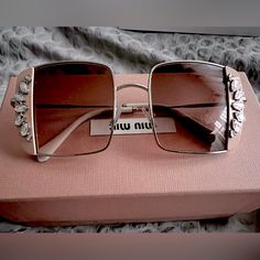 Limited Edition Crystal Embellished Square Frame Sunglasses Miu Miu 0mu 56vs. I Have 2 Left. Chic Miu Miu Sunglasses For Spring, Chic Miu Miu Spring Sunglasses, Miu Miu Elegant Gold Sunglasses, Elegant Gold Miu Miu Sunglasses, Elegant Miu Miu Sunglasses With Glass Lenses, Elegant Miu Miu Glass Sunglasses, Silver Glamorous Ladies' Sunglasses, Luxury Miu Miu Evening Sunglasses, Designer Miu Miu Sunglasses For Summer