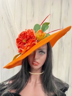 Ready to ship today from Tennessee, USA. I ship quickly and package safely in boxes.  See more  distinctive hat choices at my Etsy shop at https://www.etsy.com/shop/equineelan   This hat has an oversize brim of 6 inches for a total width of 19 inches and is a vibrant rich orange color with a big gorgeous peony flower. The flower is a beautiful mix of peach, pink and coral tones. Two dark orange/coral colored quills kick this hat into Derby Couture. Wear it level on your head or tilt it over one Orange Curved Brim Sun Hat For Spring, Orange Brimmed Spring Hat, Orange Curved Brim Hat For Spring, Orange Wide Brim Sun Hat For Spring, Orange Sun Hat With Curved Brim, Orange Curved Brim Sun Hat, Orange Wide Brim Straw Hat For Spring, Adjustable Orange Costume Hats And Headpieces For Summer, Adjustable Orange Costume Hats For Summer