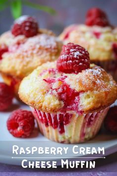 raspberry cream cheese muffins on a plate